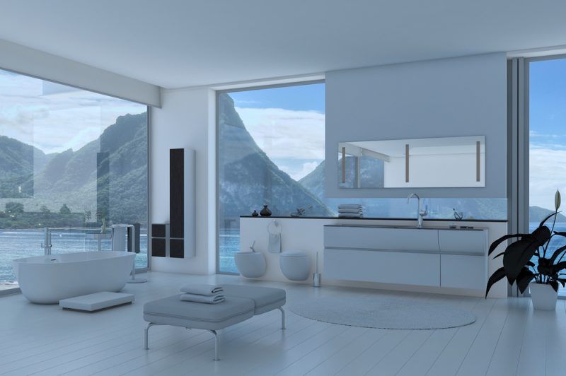 La naturaleza es el marco perfecto para complementar este moderno baño.